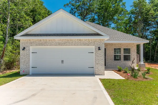 a front view of house with yard