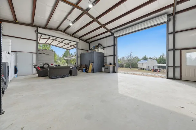 a room with gym equipment and a large window
