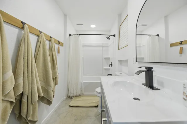 a view of backyard with sink and outdoor seating