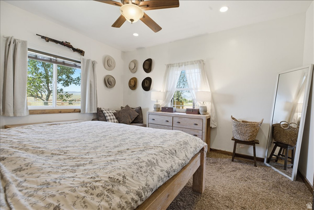 1634 West Arimo Road Arimo, ID 83214 - Photo 13 of 89 Bedroom featuring a ceiling fan with integrated lighting, recessed lighting, and white walls