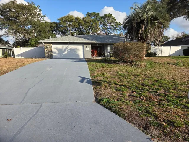 a view of house with outdoor space