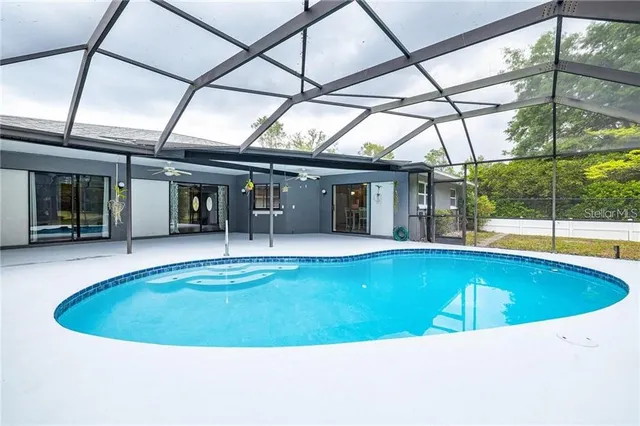 a view of a house with a swimming pool