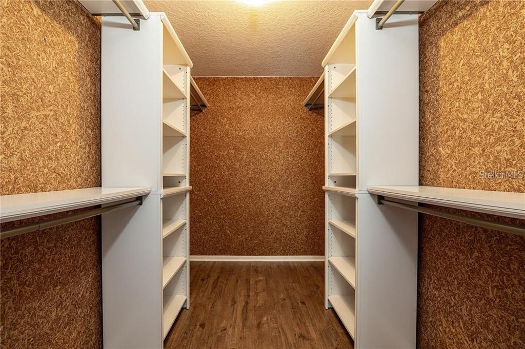 5118 Merrifield Court Spring Hill, FL 34608 - Photo 8 of 13 a view of balcony and wooden floor