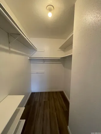 a view of small space with racks on the wall