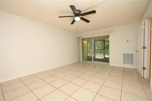 a view of an empty room and window