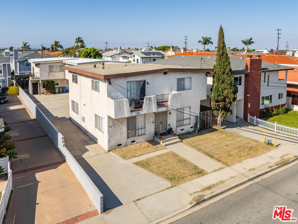 2013 Ruhland Avenue Redondo Beach, CA 90278 - Photo 7 of 11 a view of building with large windows