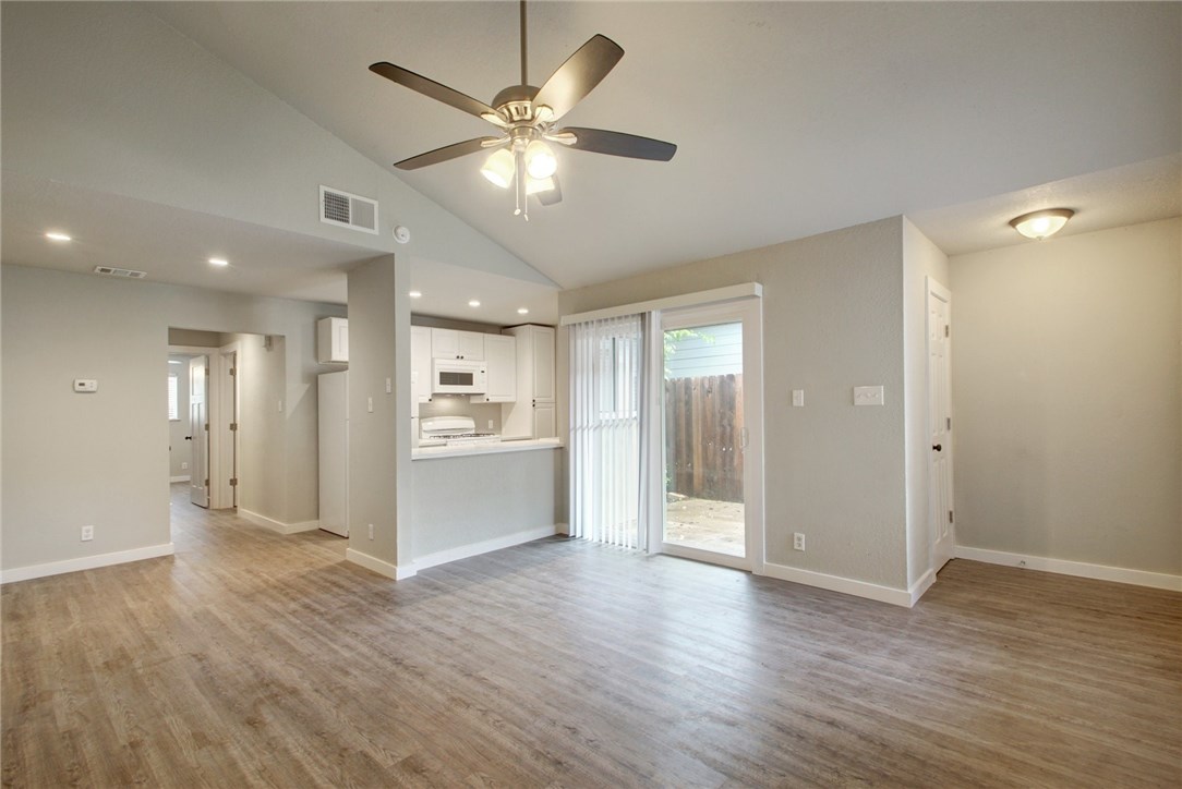 409 Blackson Avenue, Unit A Austin, TX 78752 - Photo 1 of 1 a view of a kitchen with a sink and a refrigerator