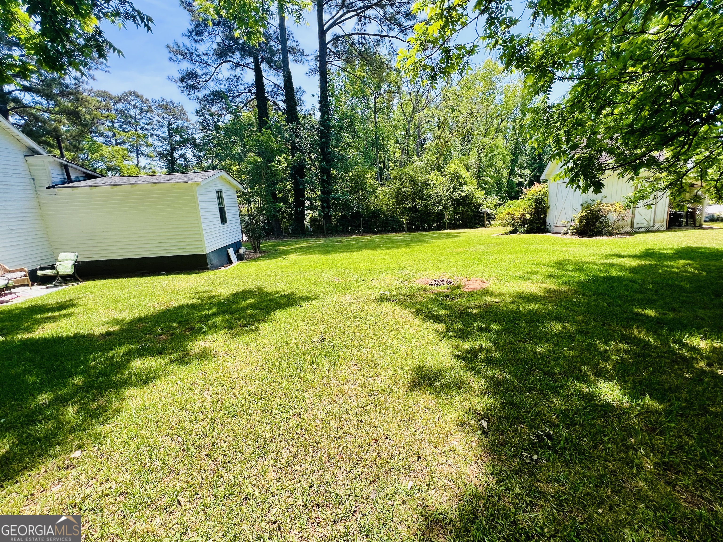 600 Foster Street Madison, GA 30650 - Photo 45 of 54 a view of an outdoor space and a yard