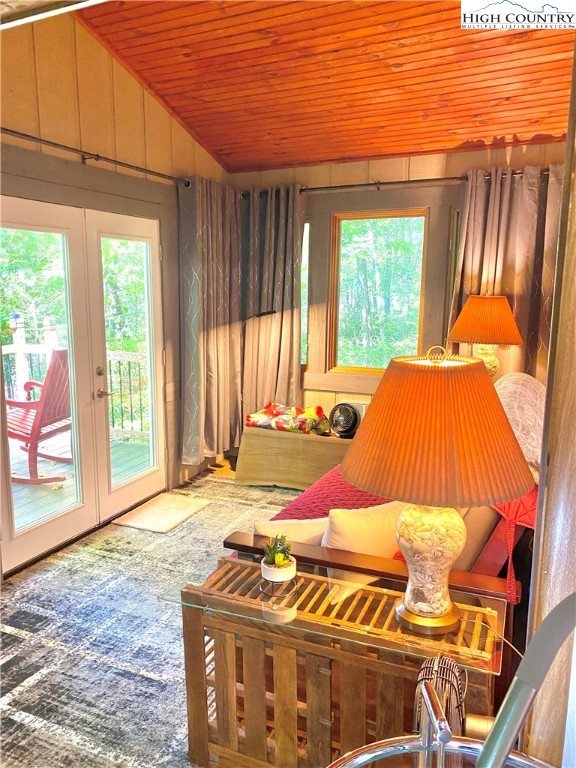 175 Ash Loop Newland, NC 28657 - Photo 19 of 46 a bedroom with a bed and wooden floor