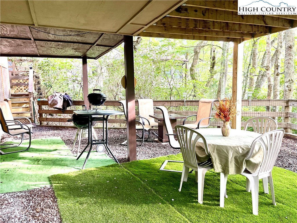 175 Ash Loop Newland, NC 28657 - Photo 33 of 46 a view of yard with seating area and furniture