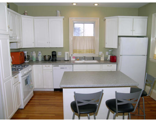 38 Holbrook Street Boston, MA 02130 - Photo 6 of 11 a kitchen with a sink cabinets and window