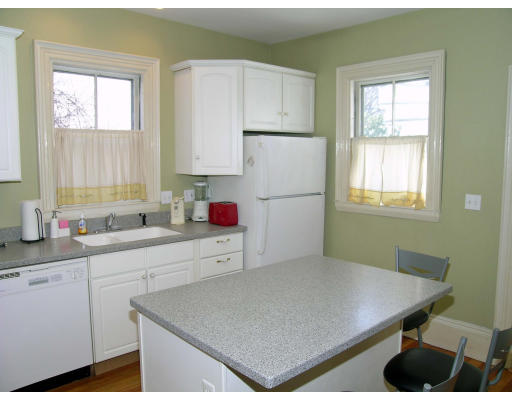 38 Holbrook Street Boston, MA 02130 - Photo 7 of 11 a kitchen with a sink cabinets and window