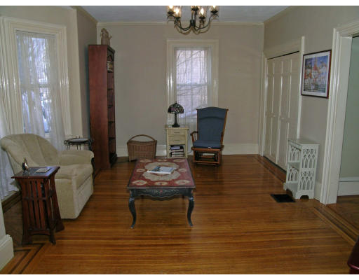38 Holbrook Street Boston, MA 02130 - Photo 8 of 11 a living room with furniture and wooden floor