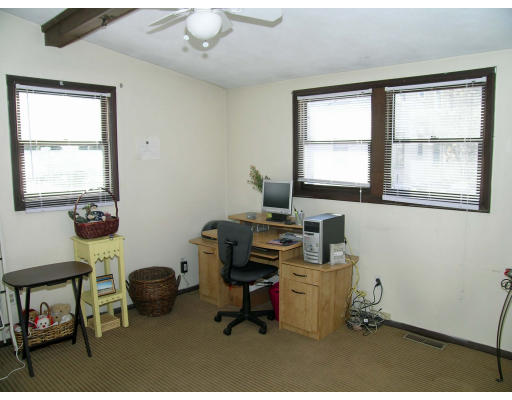 38 Holbrook Street Boston, MA 02130 - Photo 9 of 11 a view of a workspace with furniture and a window