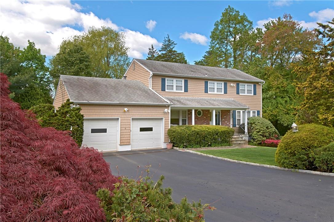 Welcome to 5 Caryl Lane. Located on a quiet cul-de-sac with only one other home in desirable Sunny Ridge!