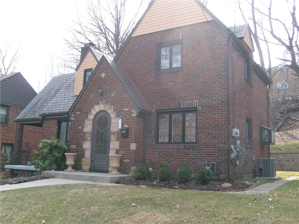 220 Cascade Road Forest Hills, PA 15221 - Photo 3 of 25 Design, design - brick and stone work, interesting peaks, slate roof, covered side porch - this is a wonderful home.