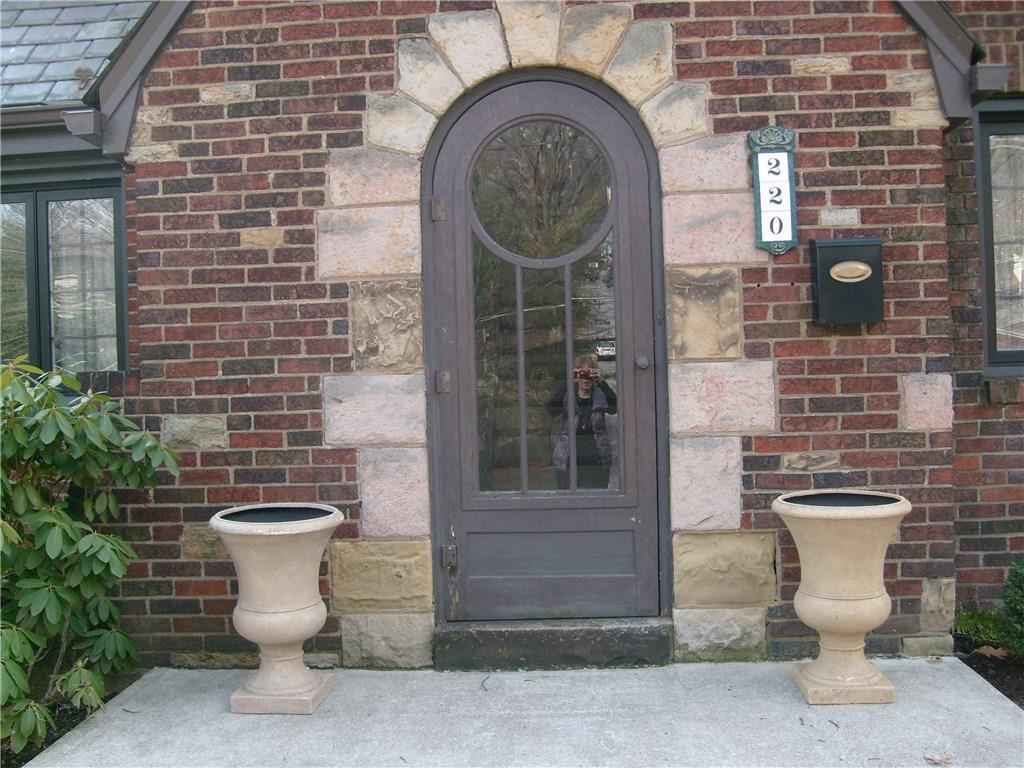 220 Cascade Road Forest Hills, PA 15221 - Photo 6 of 25 Beautiful stone work at front entrance with oval doorway