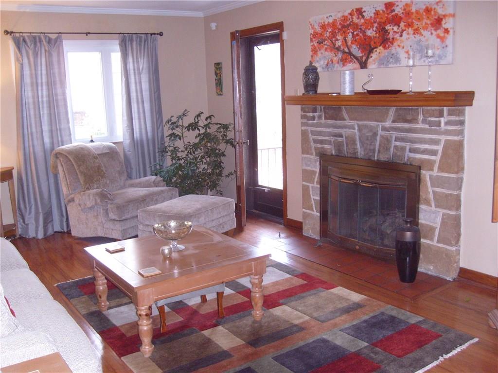220 Cascade Road Forest Hills, PA 15221 - Photo 10 of 25 Entrance off of living room to covered side porch. Magnificent hardwood floors.