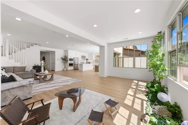 a kitchen with a sink stove and refrigerator