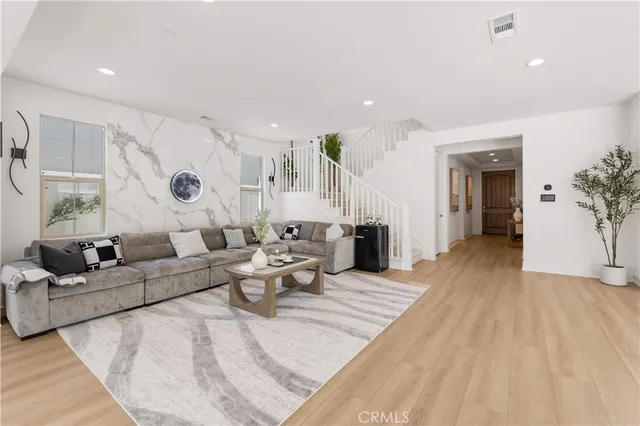 a view of a house with a snow on the road