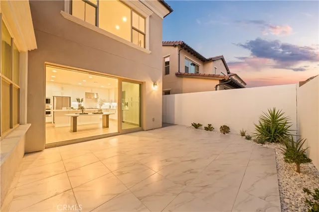 a bathroom with a bathtub shower sink mirror and toilet
