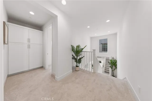a utility room with sink dryer and washer