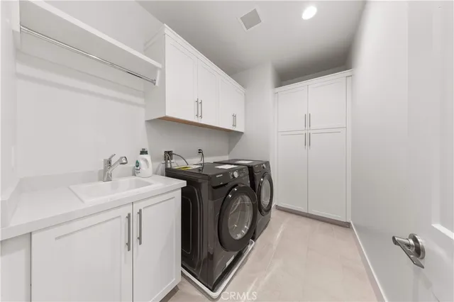 an aerial view of a house with a swimming pool