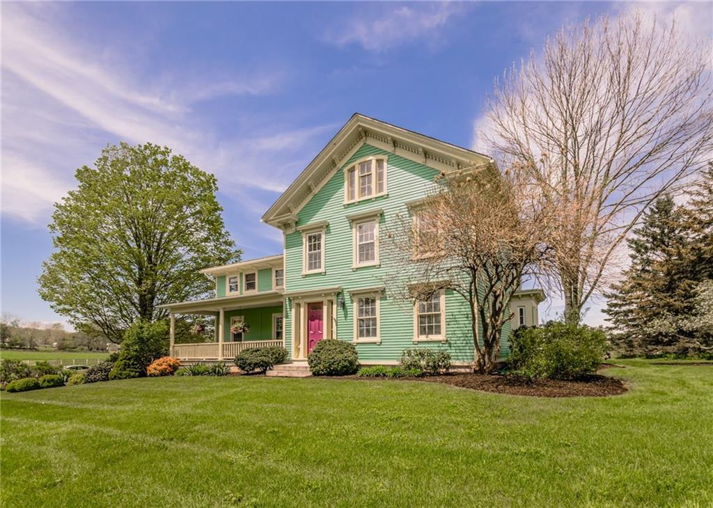 724 Exeter Road Lebanon, CT 06249 - Photo 1 of 1 a front view of a house with a garden