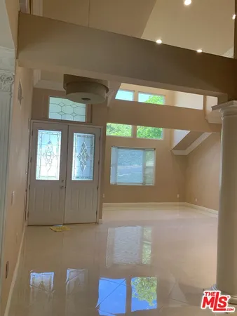 a view of an entryway with a window