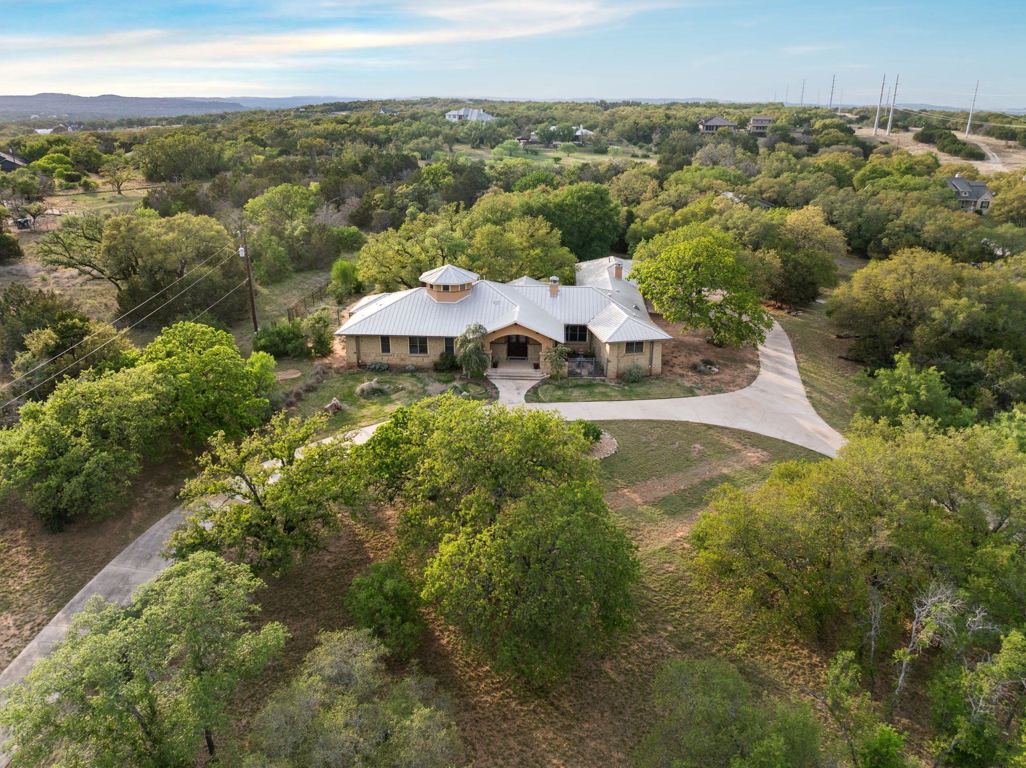 23426 Oscar Road Spicewood, TX 78669 - Photo 28 of 40 Aerial view showing the front of the home. Notice the circular driveway!