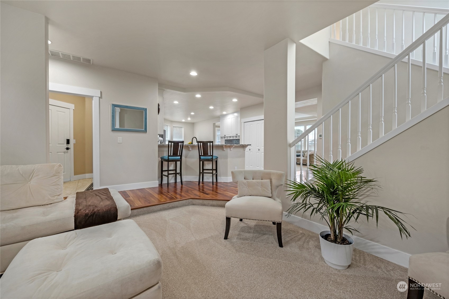 18712 33rd Avenue Southeast Bothell, WA 98012 - Photo 12 of 39 a living room with furniture and potted plant