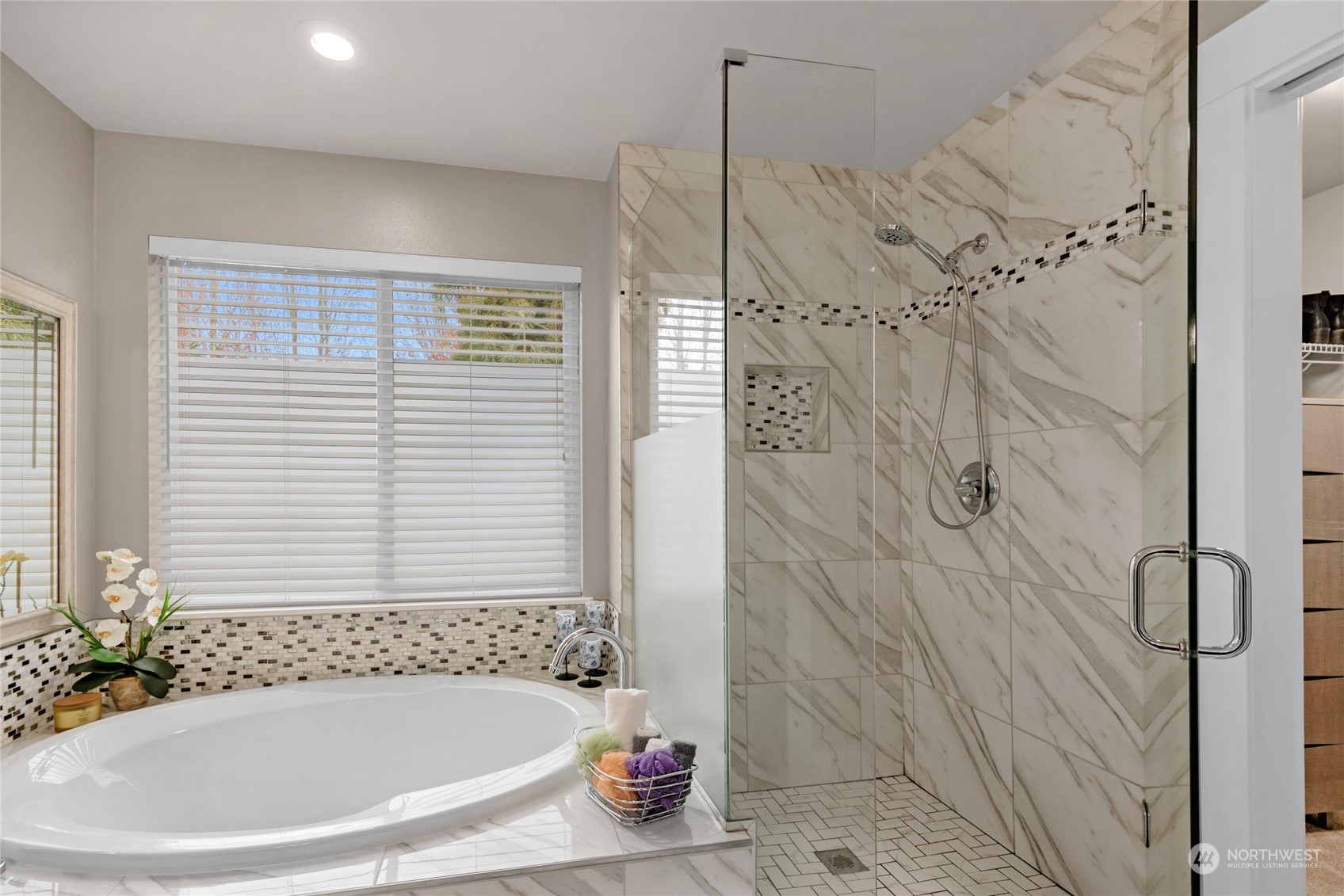 18712 33rd Avenue Southeast Bothell, WA 98012 - Photo 26 of 39 a bath tub sitting next to a window