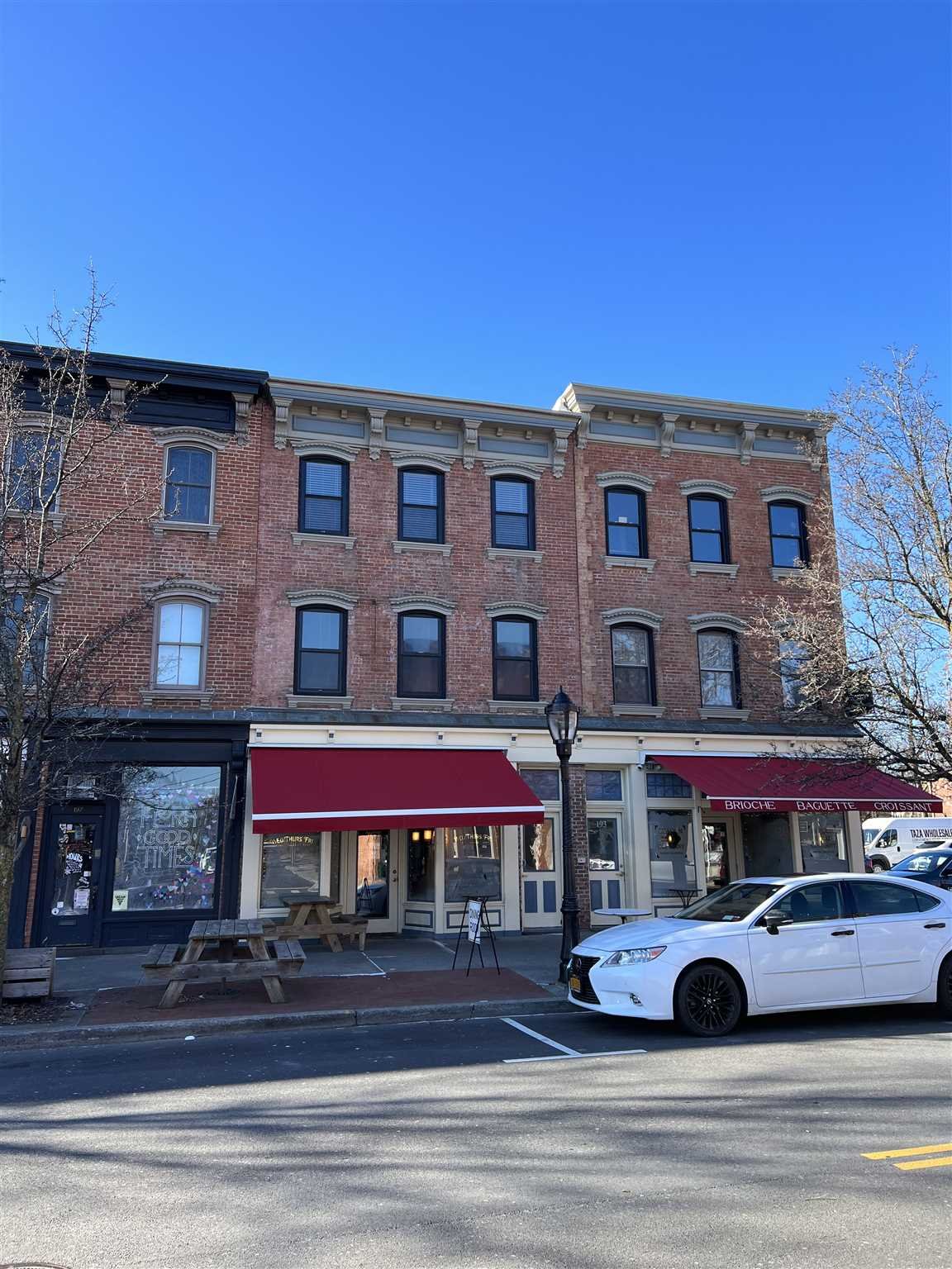 195 Main Street, Unit 2 Beacon, NY 12508 - Photo 8 of 8 a view of a building with cars parked