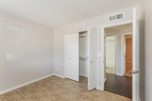 an empty room with closet