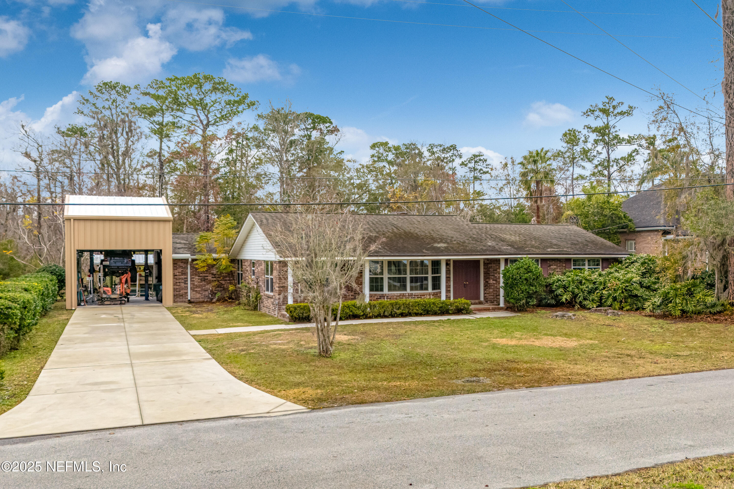 12932 Helm Drive Jacksonville, FL 32258 - Photo 12 of 42 a front view of house with yard and green space