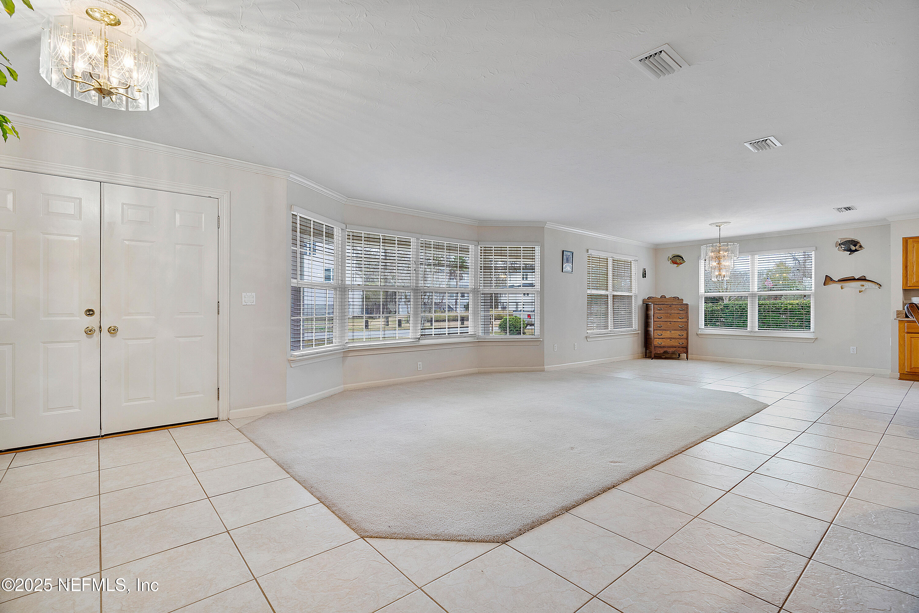 12932 Helm Drive Jacksonville, FL 32258 - Photo 2 of 42 a view of an empty room with a window