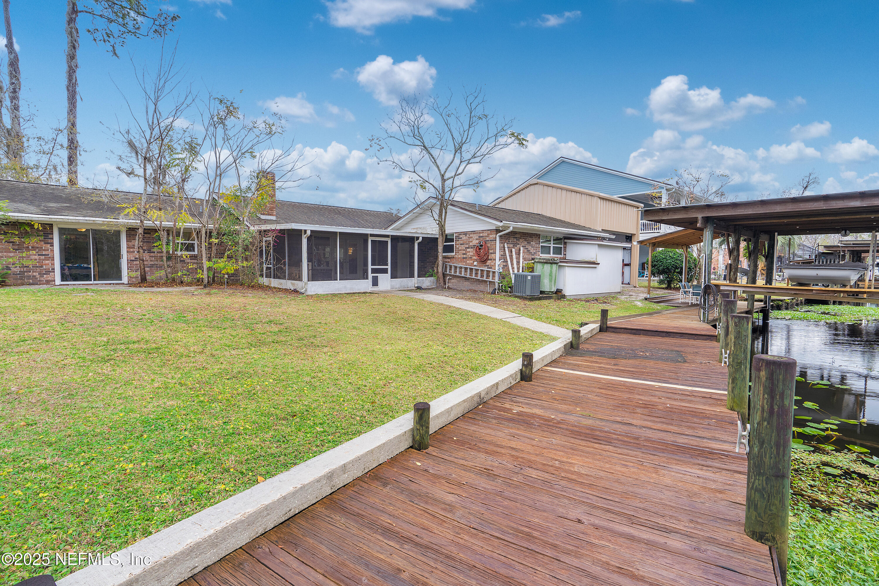 12932 Helm Drive Jacksonville, FL 32258 - Photo 28 of 42 a view of a house with swimming pool