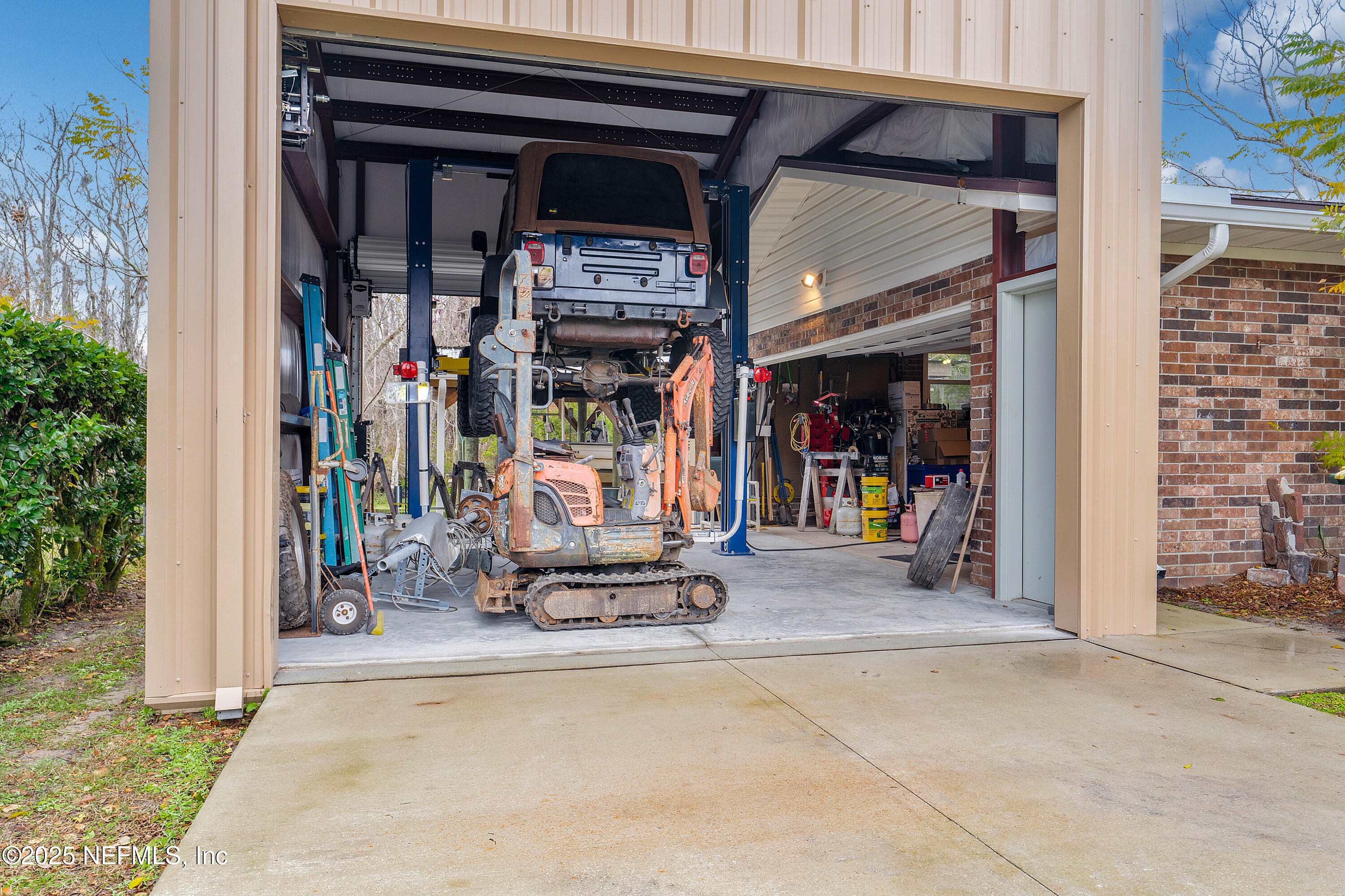 12932 Helm Drive Jacksonville, FL 32258 - Photo 33 of 42 a view of a living room with a lot of stuff