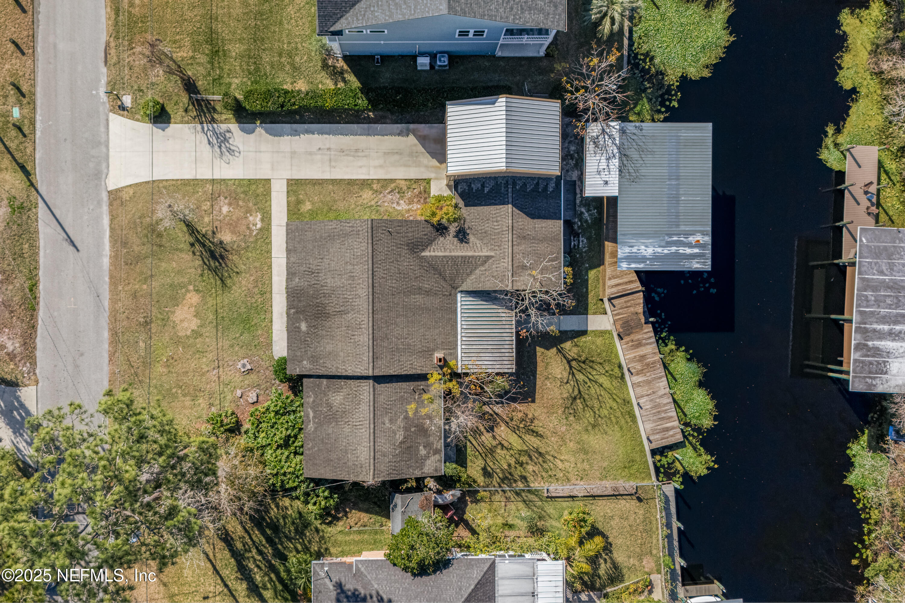 12932 Helm Drive Jacksonville, FL 32258 - Photo 41 of 42 an aerial view of residential houses with outdoor space