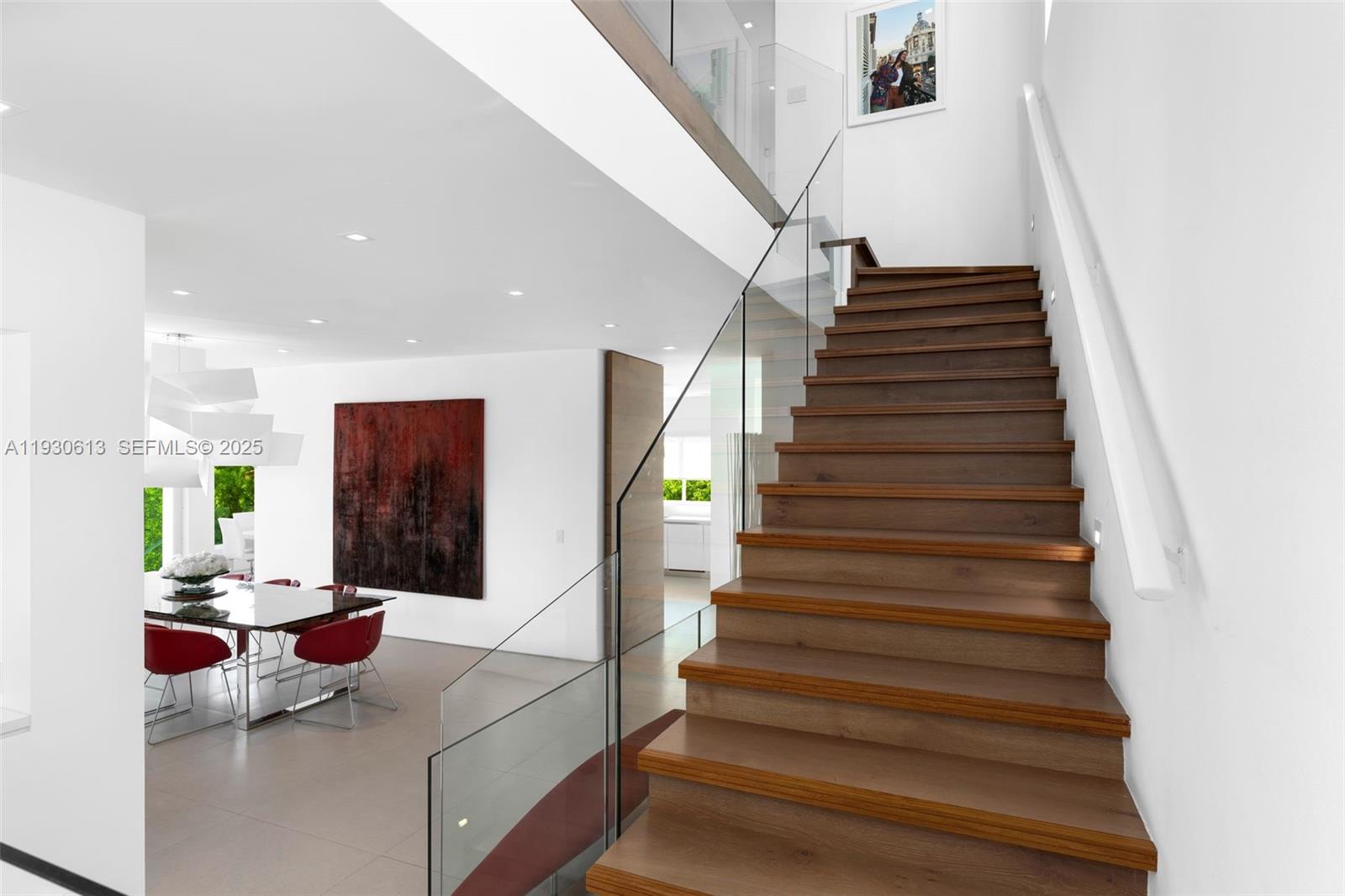 481 South Mashta Drive Key Biscayne, FL 33149 - Photo 25 of 57 a living room with furniture and a stairs
