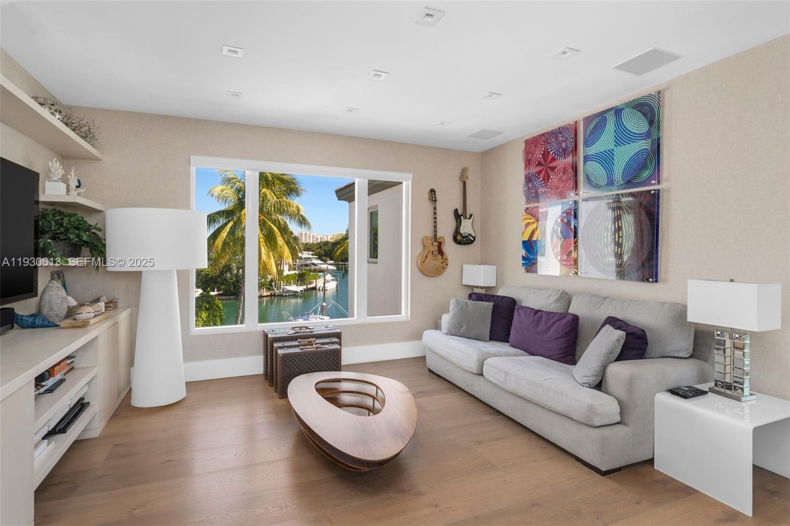 481 South Mashta Drive Key Biscayne, FL 33149 - Photo 26 of 57 a living room with furniture and a large window
