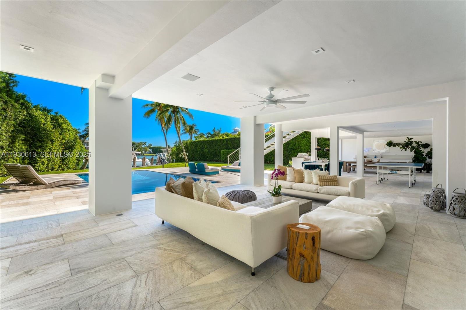 481 South Mashta Drive Key Biscayne, FL 33149 - Photo 41 of 57 a living room with furniture and a large window