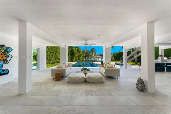 a view of swimming pool with lounge chair