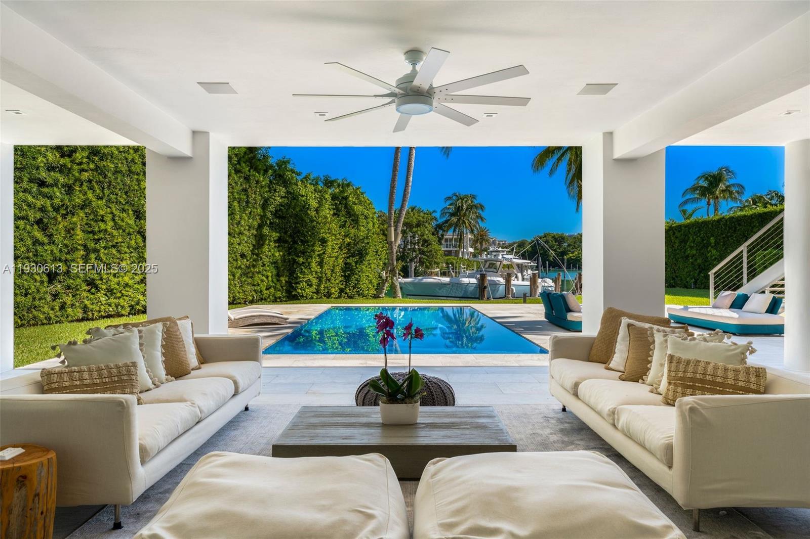 481 South Mashta Drive Key Biscayne, FL 33149 - Photo 6 of 57 a living room with furniture and a large window