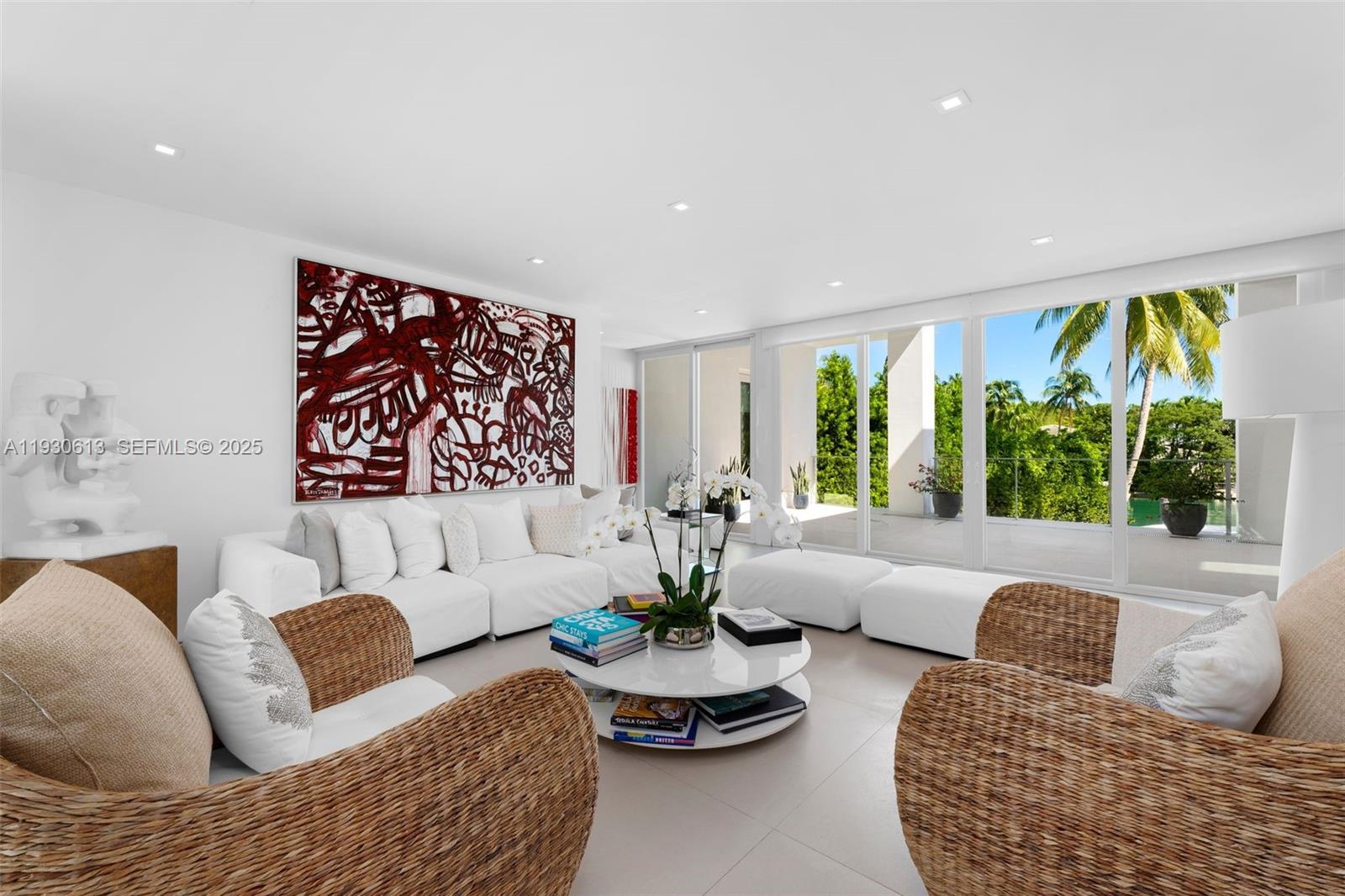 481 South Mashta Drive Key Biscayne, FL 33149 - Photo 8 of 57 a living room with furniture and a large window