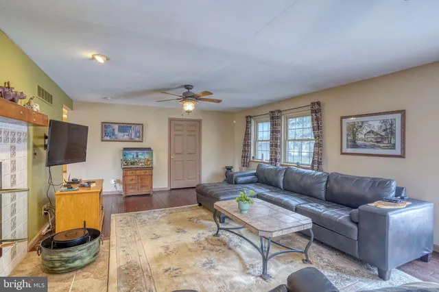 a kitchen with a stove a sink and cabinet