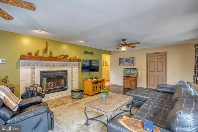 a kitchen with granite countertop a sink appliances and cabinets