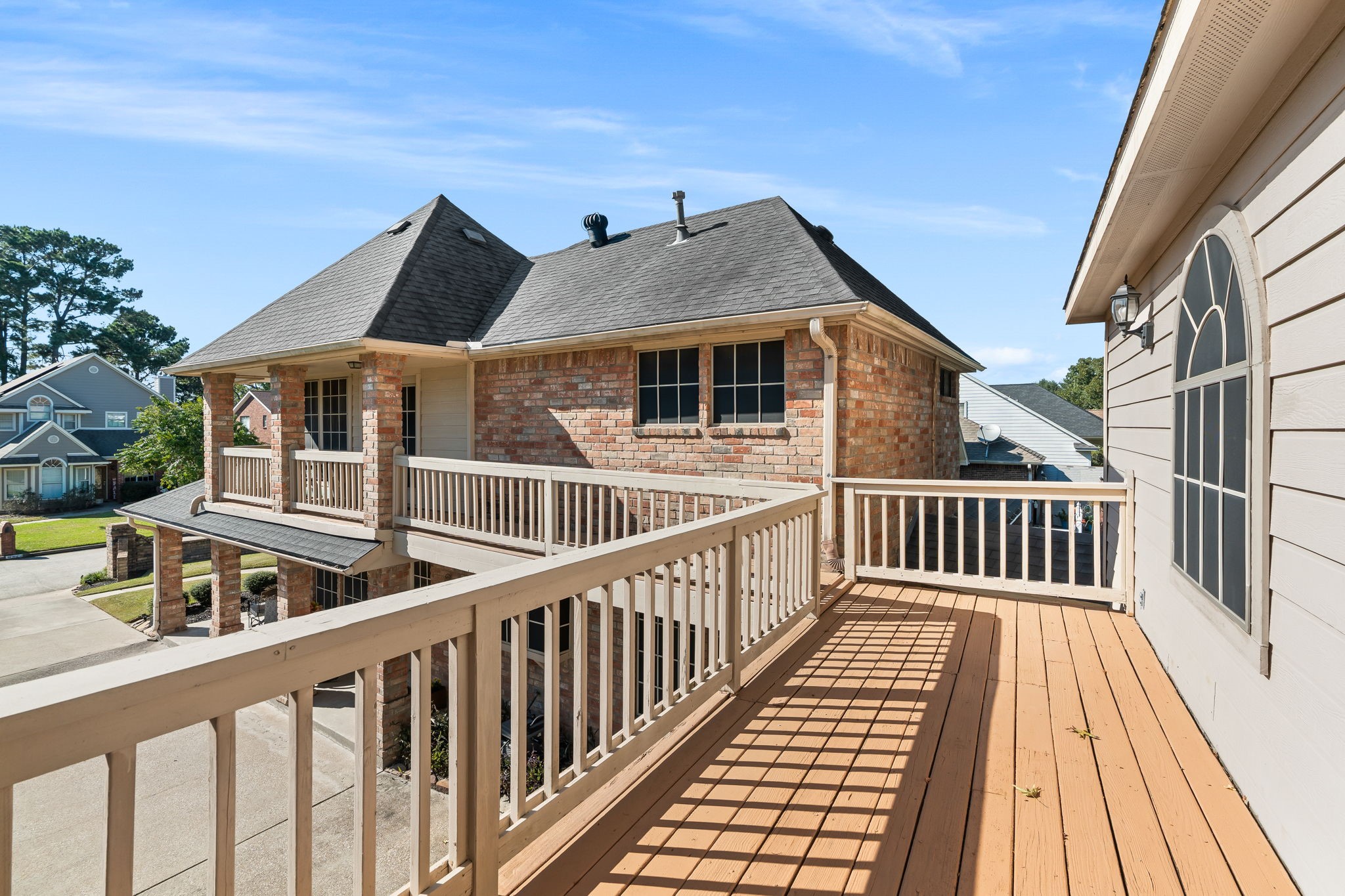 6971 Breezy Point Willis, TX 77318 - Photo 28 of 49 This is the balcony that leads to the quarters above the garage. There is an outside staircase also.