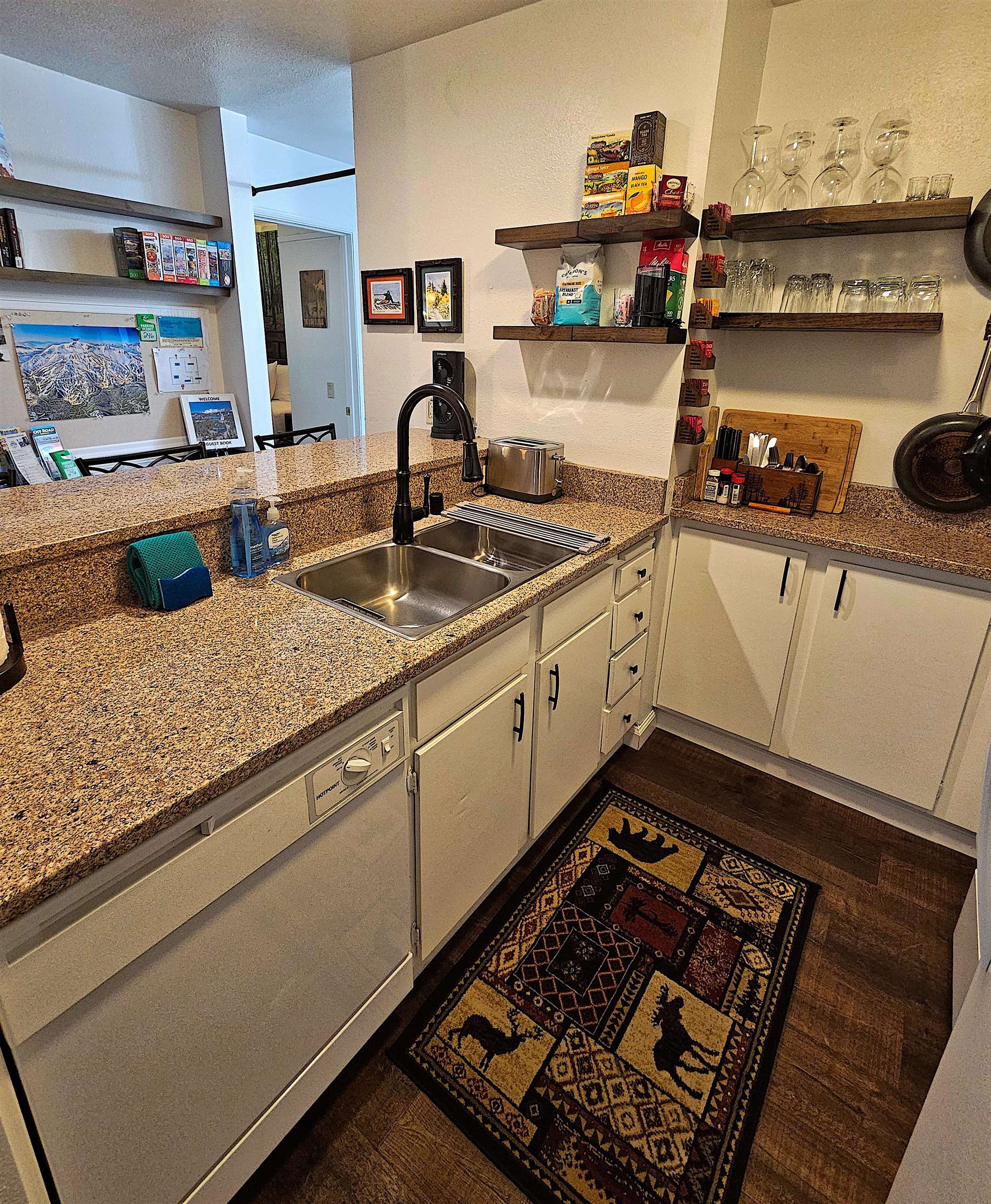 3253 Meridian Boulevard, Unit 246 Mammoth Lakes, CA 93546 - Photo 12 of 36 a kitchen with sink and stove