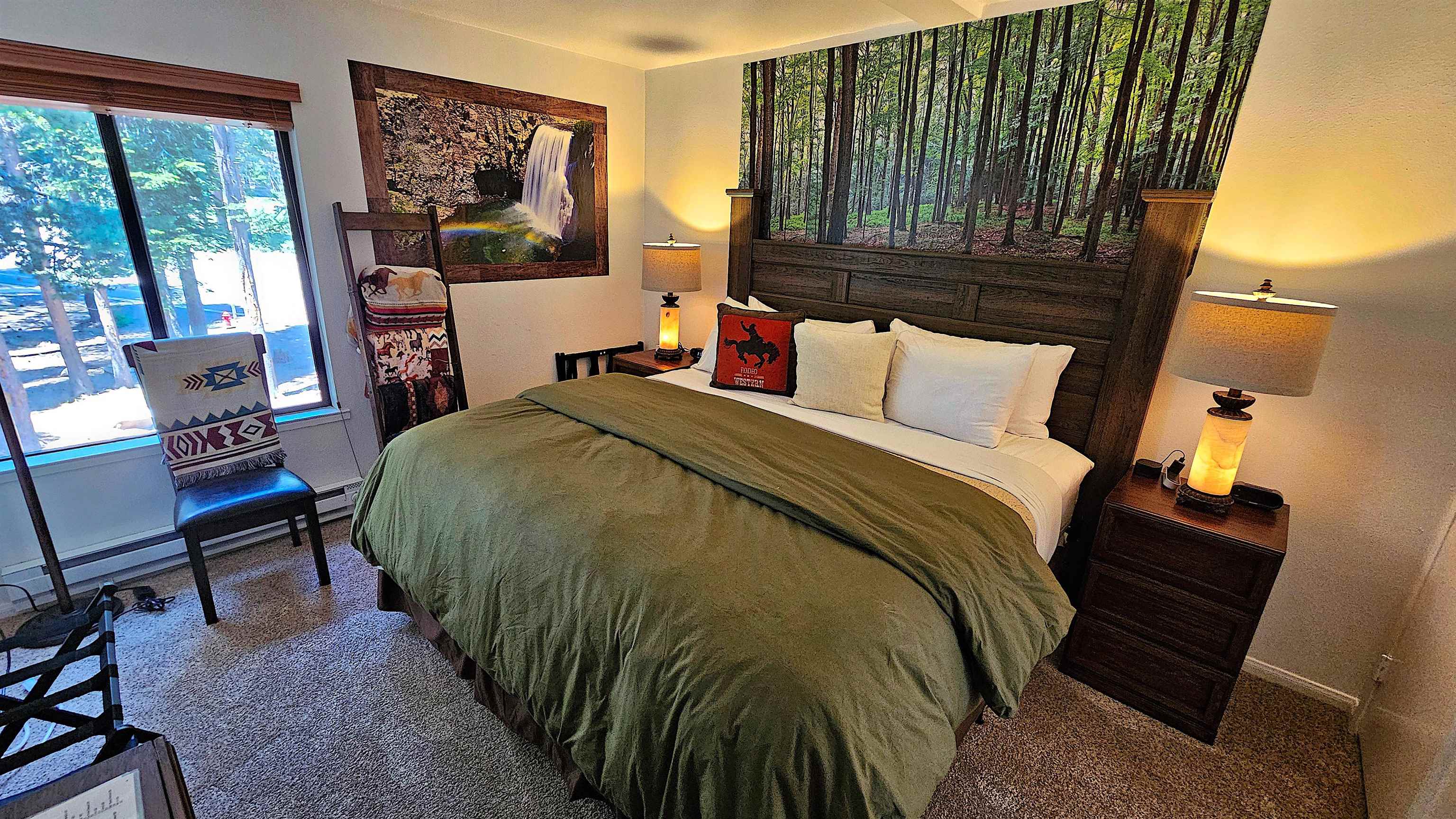 3253 Meridian Boulevard, Unit 246 Mammoth Lakes, CA 93546 - Photo 18 of 36 a bed sitting in a bedroom next to a window